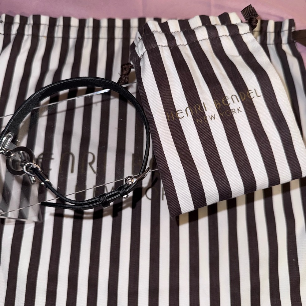 Henri Bendel Black double wrapped signature bracelet with Striped Pouch